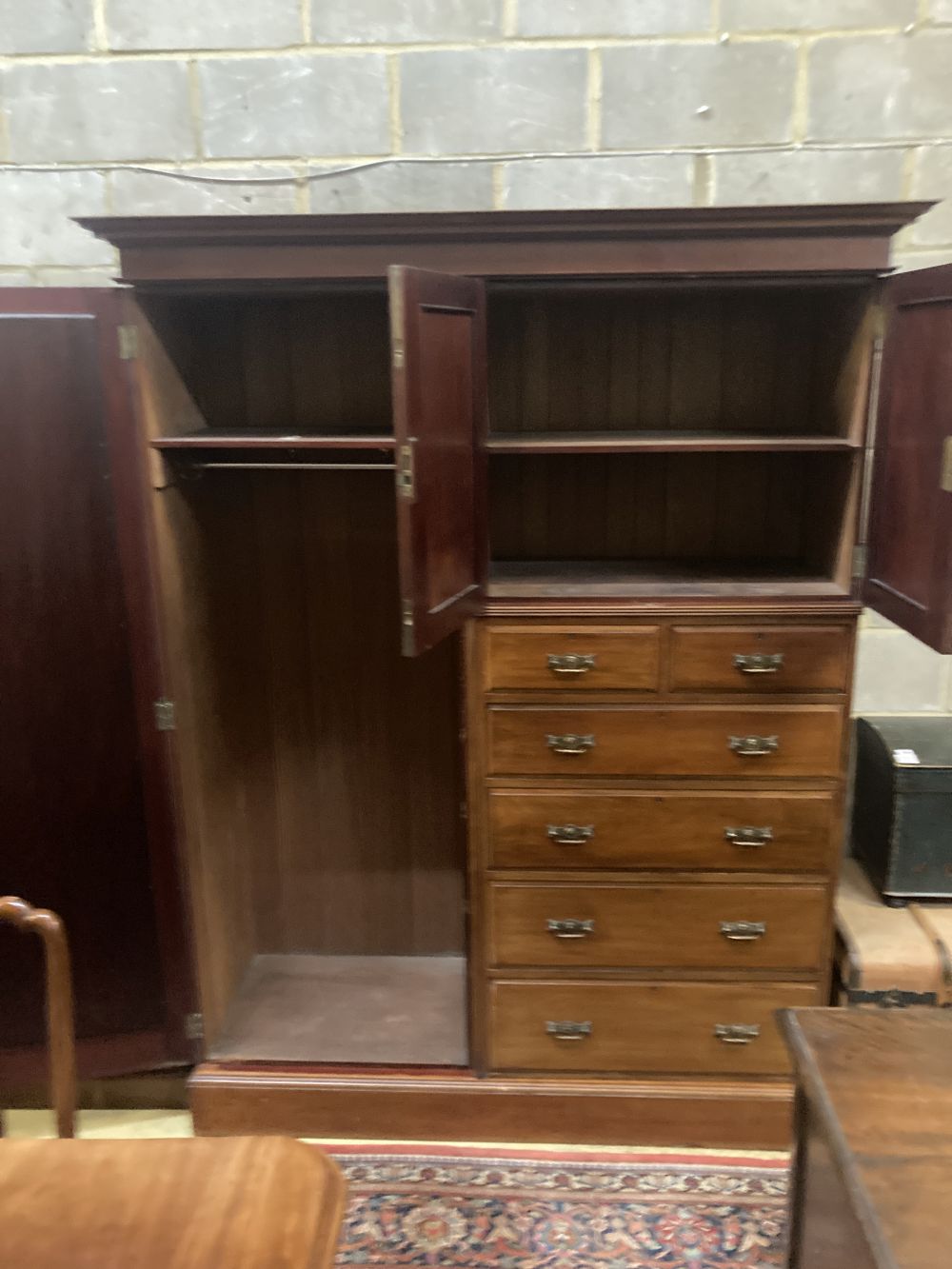 An Edwardian walnut wardrobe, width 161cm depth 56cm height 209cm